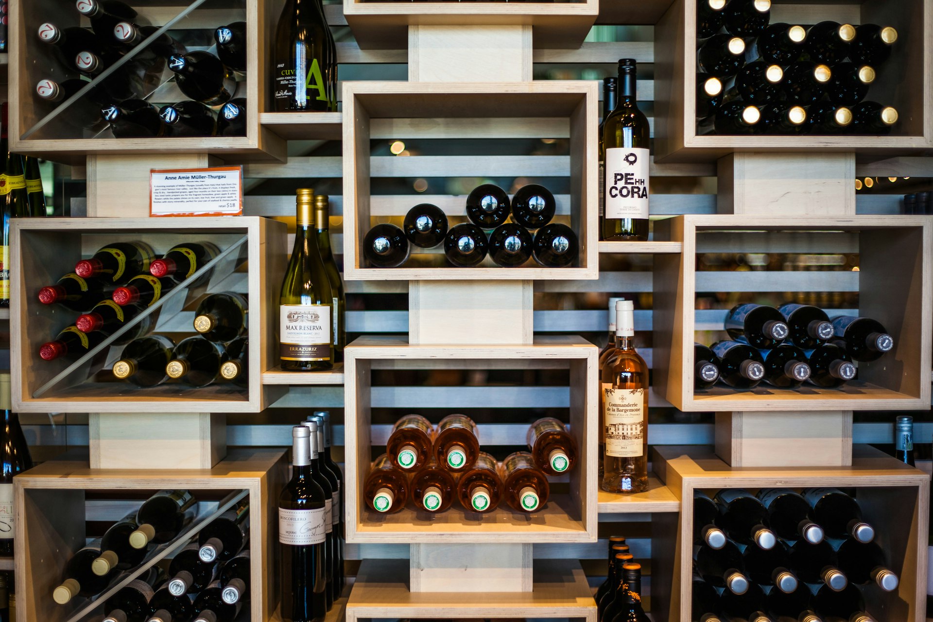 brown wooden wine bottle rack